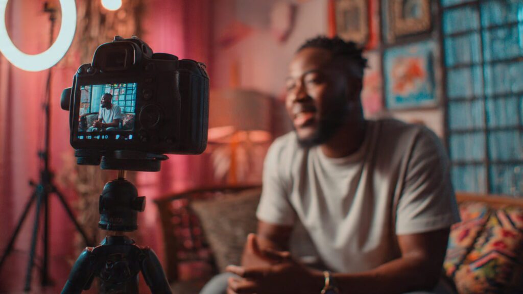 Nigerian content creator filming Instagram Reel with captions — organic Instagram growth strategy for Nigerian businesses 2026