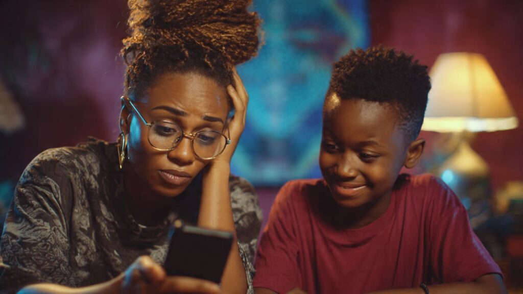 Nigerian Instagram creator looking at stalled follower count on phone screen in Lagos 2026