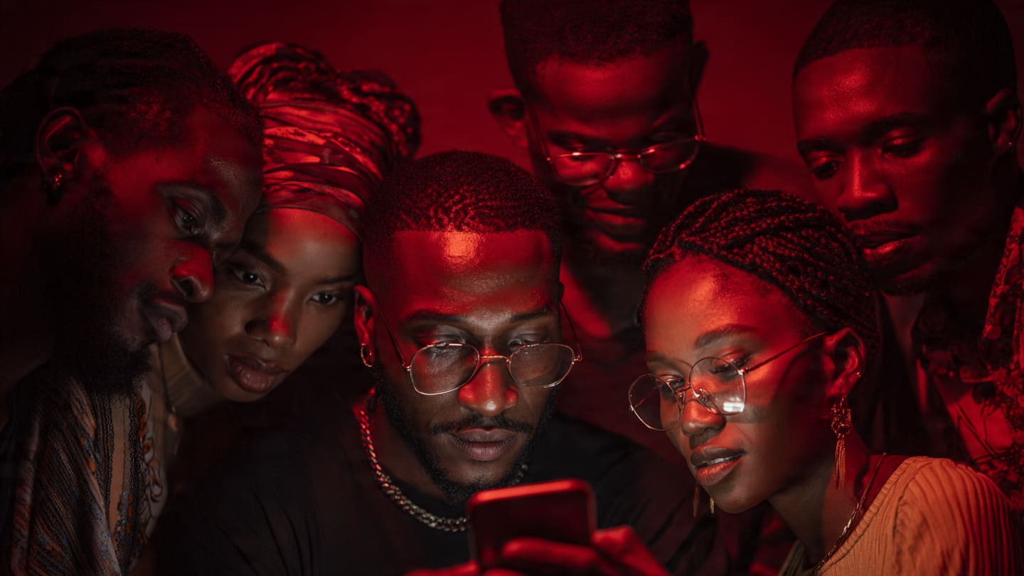 A group of successful Nigerian influencers boost Instagram comments digital creators analyzing their viral Instagram comment section in a Lagos studio.
