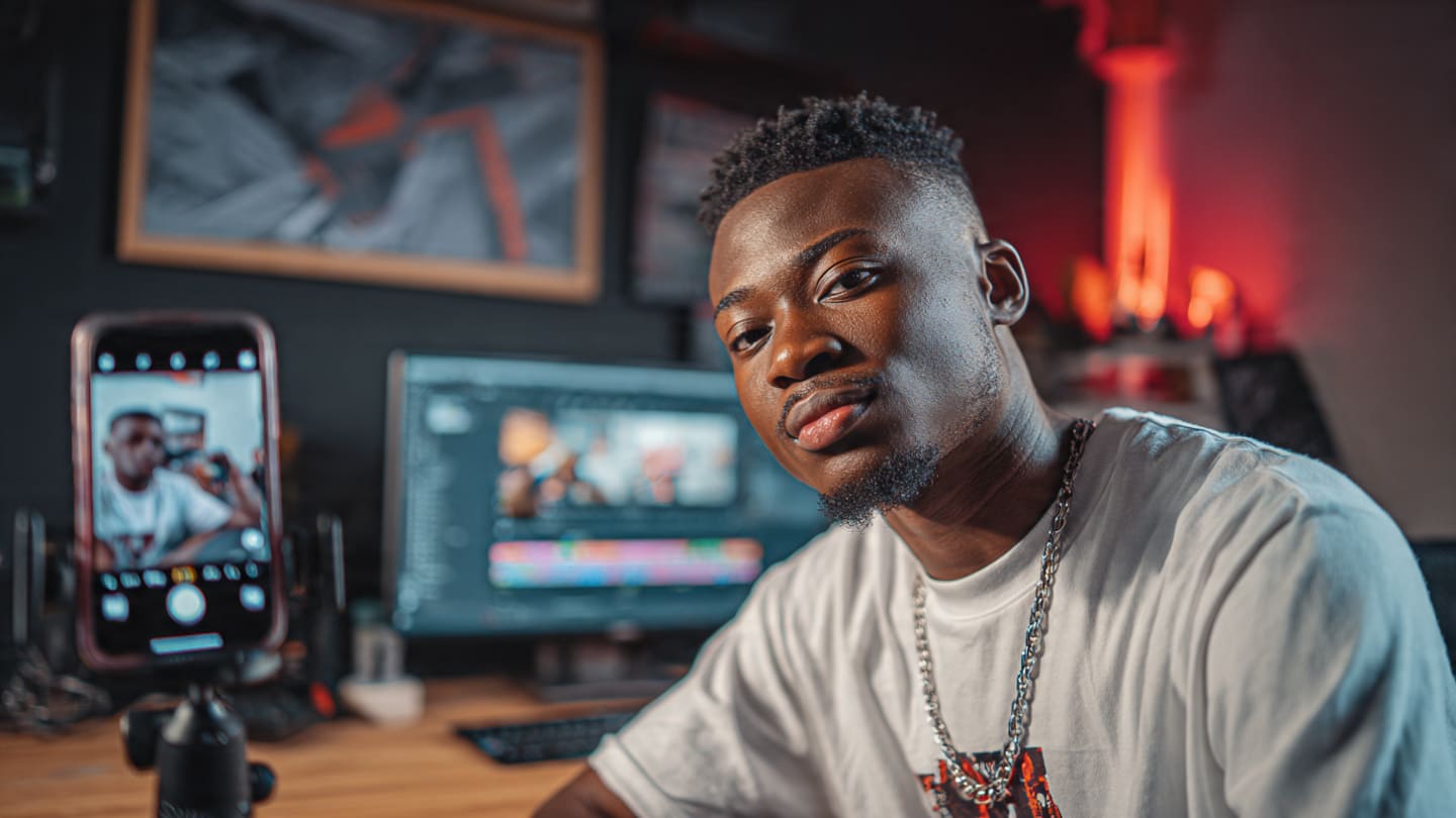 Nigerian creator filming to Increase Instagram Reel Comments despite high views