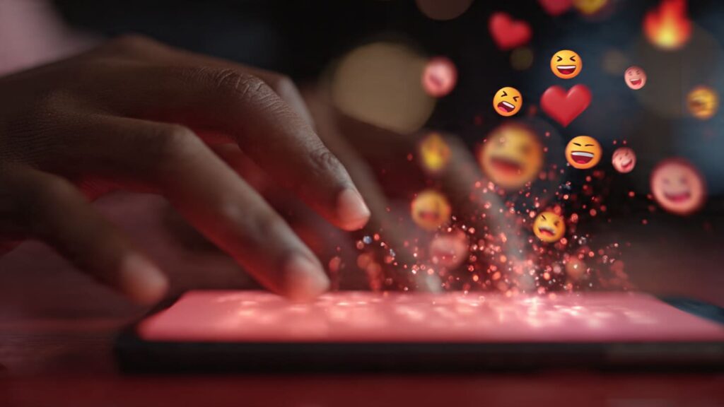 Hand typing Instagram replies and Instagram caption CTAs for comments