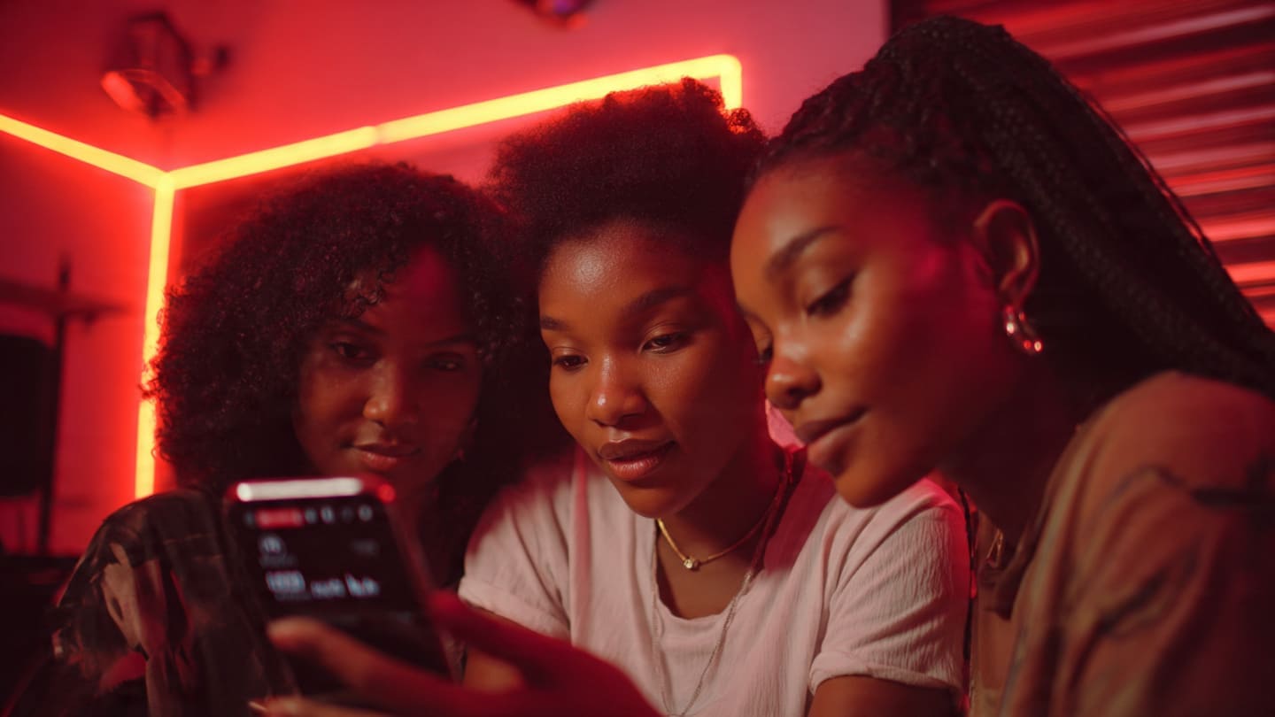 Nigerian creator boosting Instagram Reels reach in a Lagos home studio.
