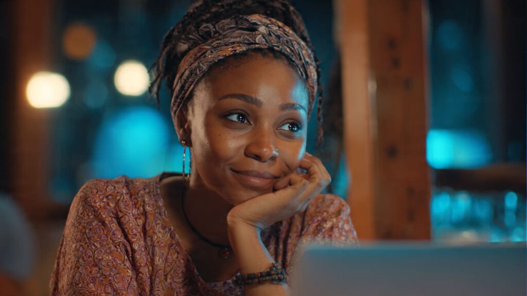 Nigerian woman looking and trying to grow instagram comment count