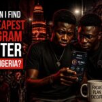 Ambitious Nigerian creator holding phone in studio